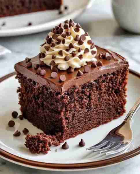 Grandma's Chocolate Texas Sheet Cake Recipe 🍫 Indulge in this timeless chocolate sheet cake—a rich...