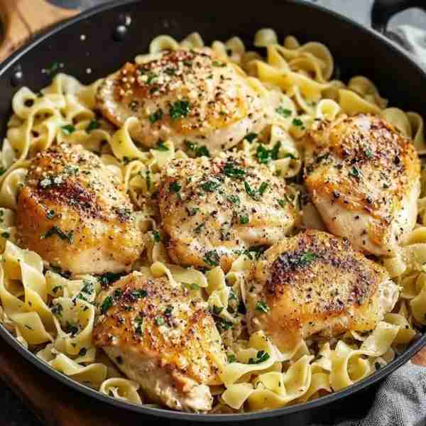 Savory Garlic Butter Chicken with Herb-Infused Noodles Ingredients: 2 boneless, skinless chicken bre...