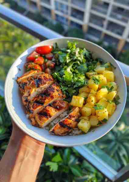 Enjoy the bold flavors of Lemon-Ginger Chicken with Pineapple Salsa Bowl—a refreshing and zesty dish...