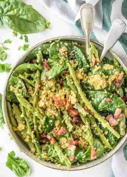 Our Asparagus Quinoa + Bacon Spinach Salad is perfect in every way! We have lots of greens, with ad...