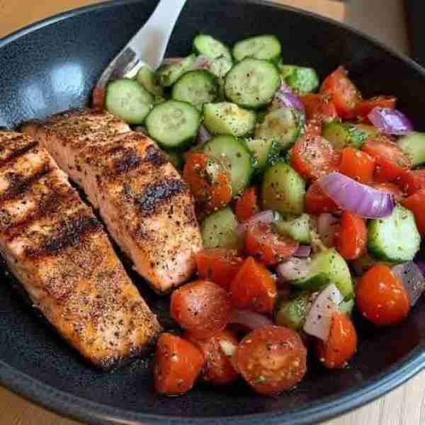 Grilled Salmon with Cucumber Tomato Salad 🍽🔥 ⏱ Prep Time: 10 mins | 🔥 Cook Time: 10 mins | 🍽 Servi...