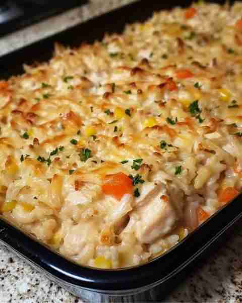Creamy Chicken Rice Casserole Ingredients: 3 cups rotisserie chicken, shredded 2 cups frozen mixed v...