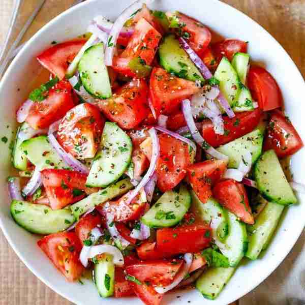 Easy Tomato Cucumber Salad **Ingredients: - 2 cups cherry tomatoes, halved - 1 large cucumber, di...