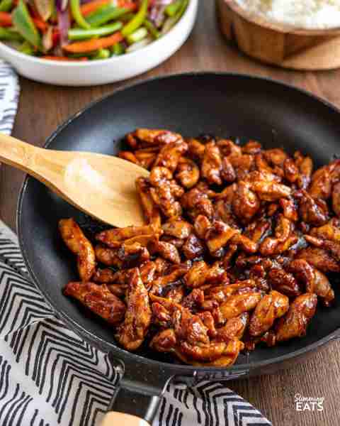 Sweet and Sticky Chicken – tender strips of seasoned chicken thigh in a lick the spoon sweet and sti...