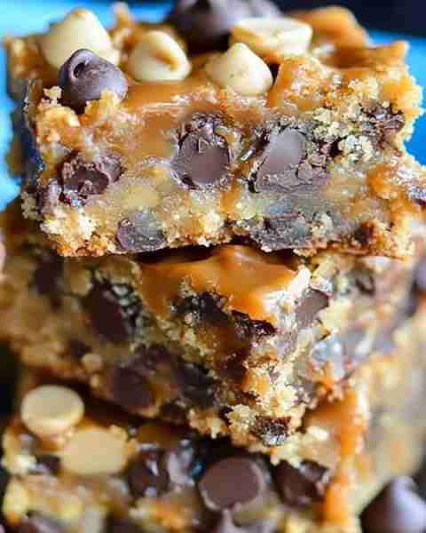 Peanut Butter Caramel Toffee Chocolate Chip Cookie Bars Ingredients: 1 cup unsalted butter, melted 1...