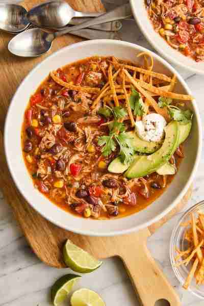 Slow Cooker Chicken Tortilla Soup - Restaurant-quality with so much flavor! No sautéing, no babysitt...
