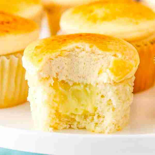 These Creme Brûlée Cupcakes are made with a moist vanilla cupcake and pastry cream filling, then top...