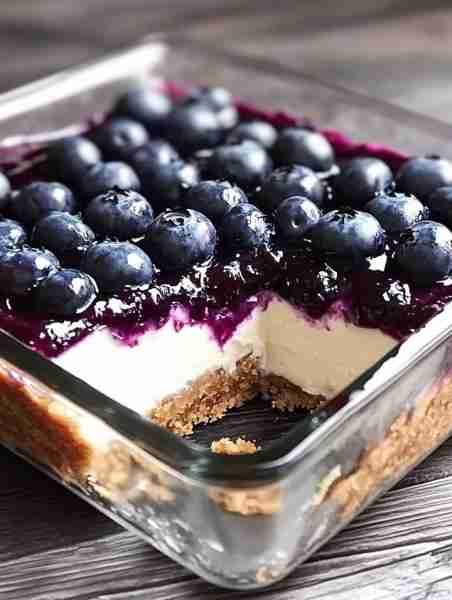 KETO BLUEBERRY CHEESECAKE BARS These creamy, tangy, and delectable Low Carb KETO BLUEBERRY CHEESECAK...