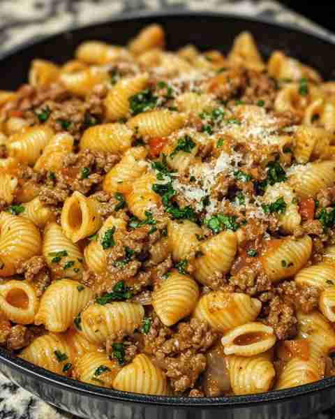 Creamy Beef and Shells Pasta Recipe Ingredients: 1 pound ground beef 1 medium yellow onion, chopped...