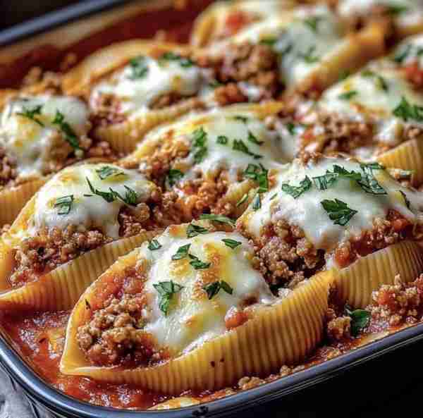 🍝✨ Beef-Stuffed Shells: Creamy ricotta, hearty beef marinara, and bubbly cheese! Ultimate pasta co...