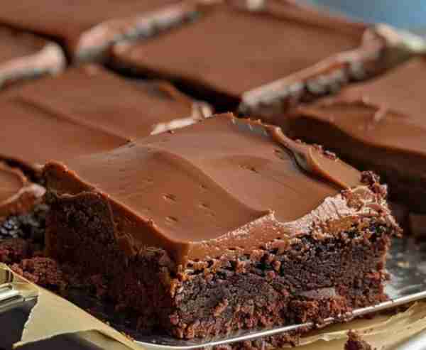 Chocolate Texas Sheet Cake is a rich, moist, and indulgent dessert that's perfect for gatherings. He...