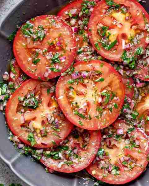 Delicious Marinated Tomato Salad 🍅🌿 **Ingredients: - 4–5 ripe tomatoes (heirloom, cherry, or Roma)...