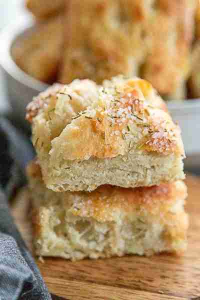 Focaccia is a soft and fluffy Italian bread resembling pizza dough. It is seasoned with olive oil an...