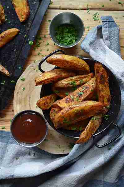 These crispy Paprika Spiced Potato Wedges make the best side dish or even snack food. Chunky potato...