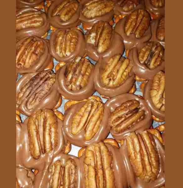 100 unwrap Rolo candies 100 pecan halfs 100 small pretzels Preheat oven to 300. Lay pretzels flat on...