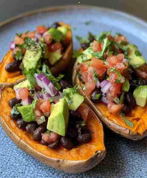 Stuffed Sweet Potatoes with Black Beans & Avocado 🥔🥑🖤 Hearty, colorful, and packed with plant-bas...