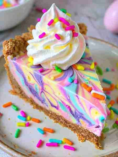 Magical and Easy Rainbow Pie Ingredients: • Crust: • 200 g of graham crackers or digestive biscuits...