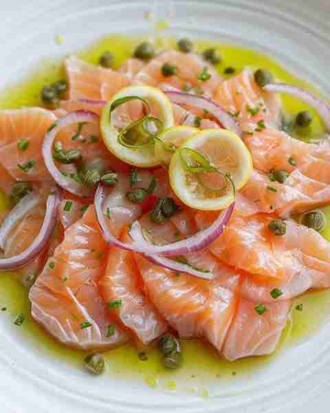 Smoked Salmon Salad with Capers & Dill Vinaigrette **Ingredients: - 8 oz smoked salmon (lox), thinly...