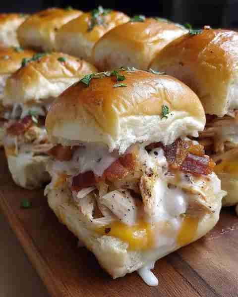 These Chicken Bacon Ranch Sliders are the perfect crowd-pleasing appetizer or easy meal! Tender shre...