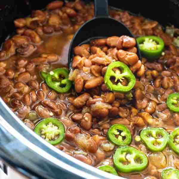 This Slow Cooker Spicy Pinto Beans recipe turns an inexpensive pound of pinto beans into a delicious...