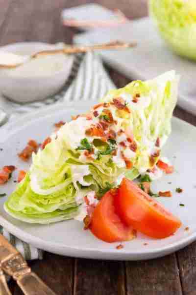 https://www.spendwithpennies.com/classic-wedge-salad/ A classic wedge salad with homemade dressing m...