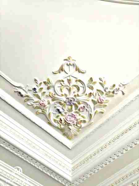 Elegant ceiling artistry — delicate floral molding that adds timeless charm and luxury to your space...