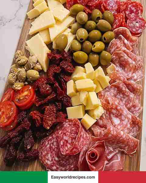 🇮🇹 Antipasto Board (Italian Charcuterie Board) A beautiful medley of cured meats, cheeses, and marin...