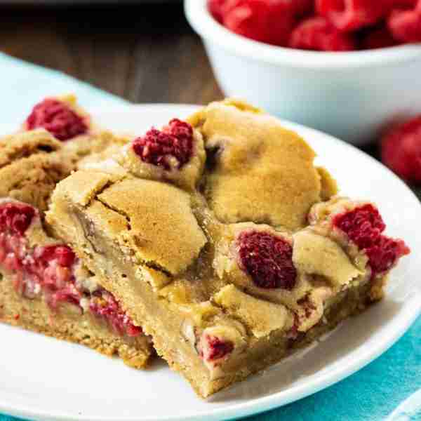 Raspberry Pecan Blondies- fresh raspberries and crunchy pecans are baked right into these buttery bl...