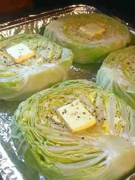Baked cabbage steaks preheat oven 400 wash and remove outer leaves trim stem off, cut 1 to 1 1/2 inc...