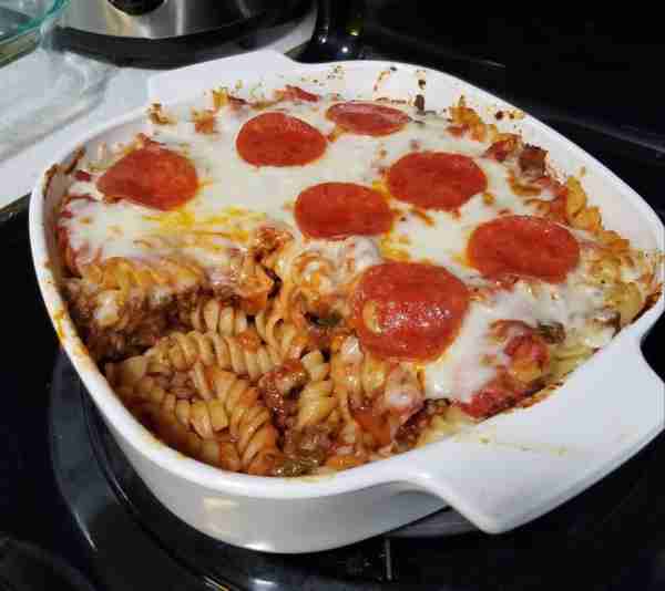 Pizza casserole is a fun and yummy kid friendly meal! Its just noodles, ground beef, pizza sauce, an...