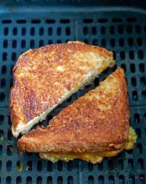 The air fryer is the answer for always crispy, always gooey grilled cheese sandwiches. Here's how to...