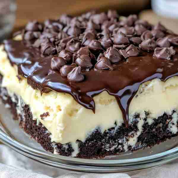 Boston Cream Poke Cake Recipe Ingredients: 1 box yellow cake mix (plus ingredients required on the b...