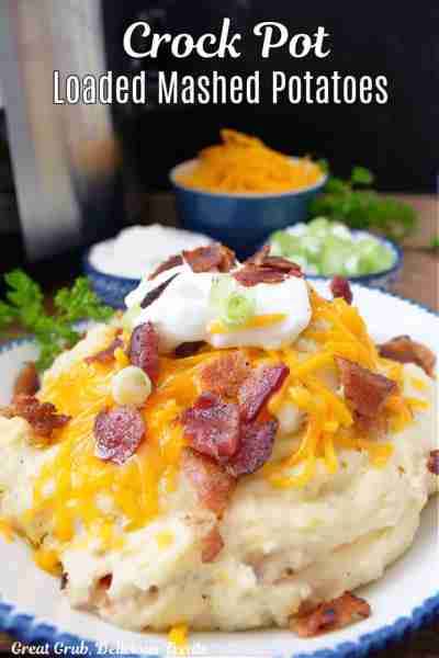 CROCK POT LOADED MASHED POTATOES are an easy way to make loaded mashed potatoes in the slow cooker....