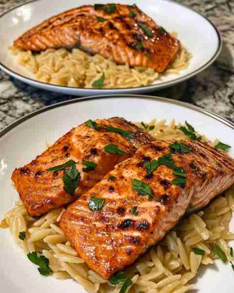 Smoked Paprika Salmon with Roasted Garlic Orzo Smoky Paprika-Crusted Salmon with Creamy Roasted Garl...