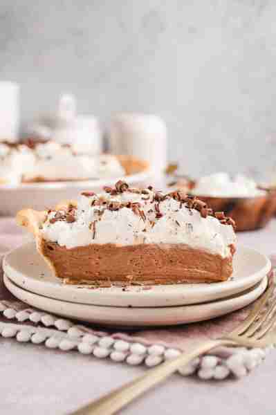 This decadent French Silk Pie is a chocolate lover’s dream! 🍫 Fluffy mousse, whipped cream, and cho...