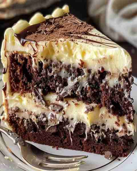 Craving something sinfully delicious? This Chocolate Gooey Butter Cake will satisfy all your chocola...