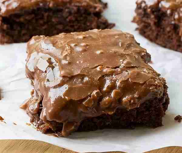 A moist and delicious chocolate cake made with buttermilk and cocoa powder and topped with a homemad...