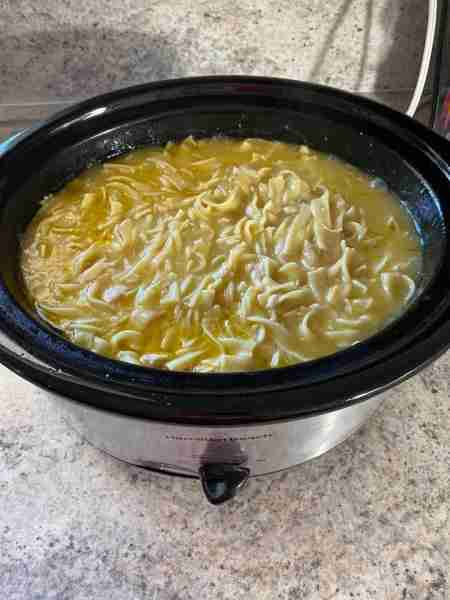 Homemade chicken noodle soup 🍜 2 frozen chicken breast, 8 cups of chicken broth, 1 family size can...