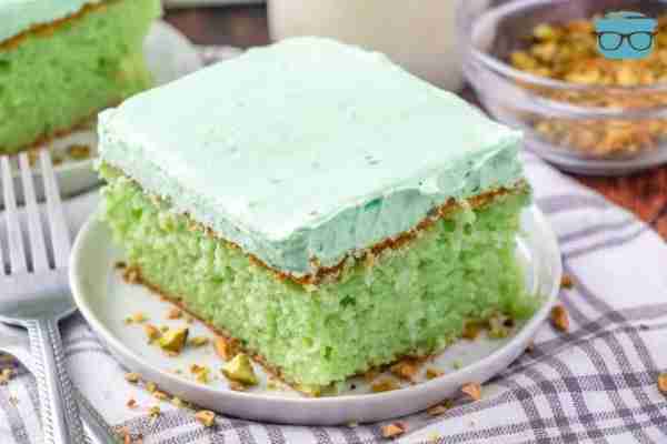 Pistachio Pudding Cake Bake 350° 25-30 mins For the cake: 1 box of White cake mix 1 (3.4 oz) Pistach...