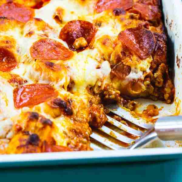Meat Lovers Bubble Up Pizza- this refrigerated biscuit casserole is full of sausage and pepperoni pl...