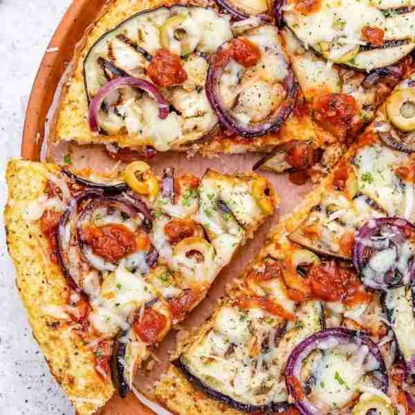 Our (rave-reviewed) cauliflower crust pizza topped with grilled seasonal vegetables. SO GOOD! Grill...