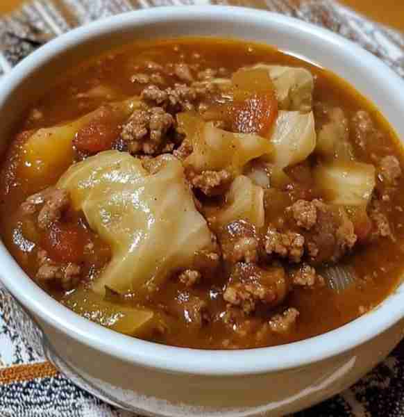 Hearty Cabbage Soup with Ground Beef Ingredients: 1 large head of cabbage, chopped 2 small onions, d...