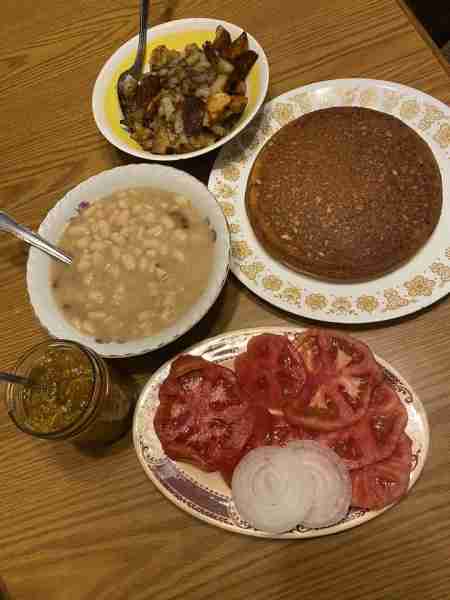 Supper tonight in NE Arkansas. Soup beans(great northern) cooked up with some bacon, fried potatoes,...