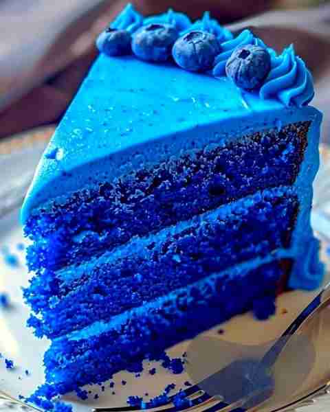 BLUE VELVET CAKE For the Cake: 2½ cups all-purpose flour 2 tbsp cocoa powder (unsweetened, just a hi...
