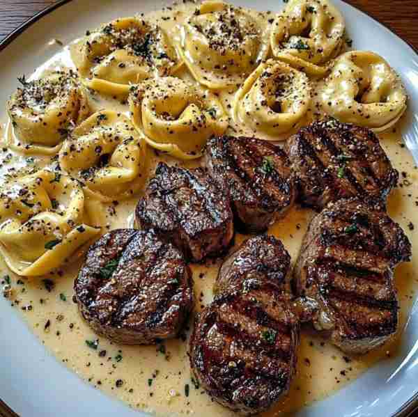 Creamy Garlic Tortellini with Steak Bites A rich, satisfying dish that combines tender steak and che...