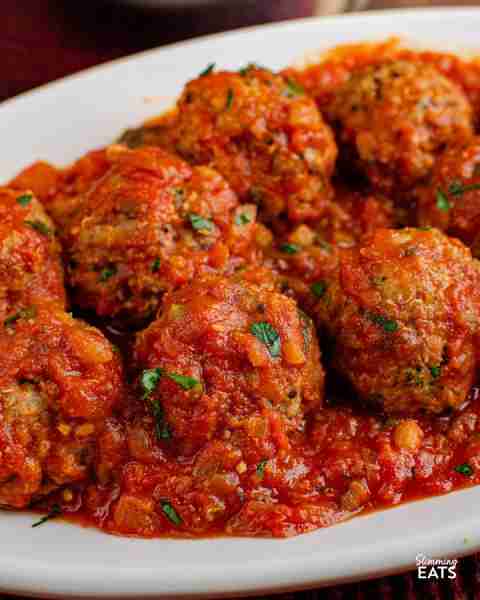 Tender flavourful Chicken Quinoa Meatballs in a delicious veggie sauce. 😍 Recipe 👉 https://www.sl...