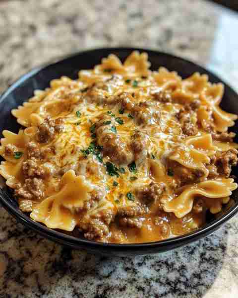 CAJUN BEEF PASTA WITH BOWTIE NOODLES Ingredients: 2.25 pounds ground beef 1 (8 oz) block cream chees...