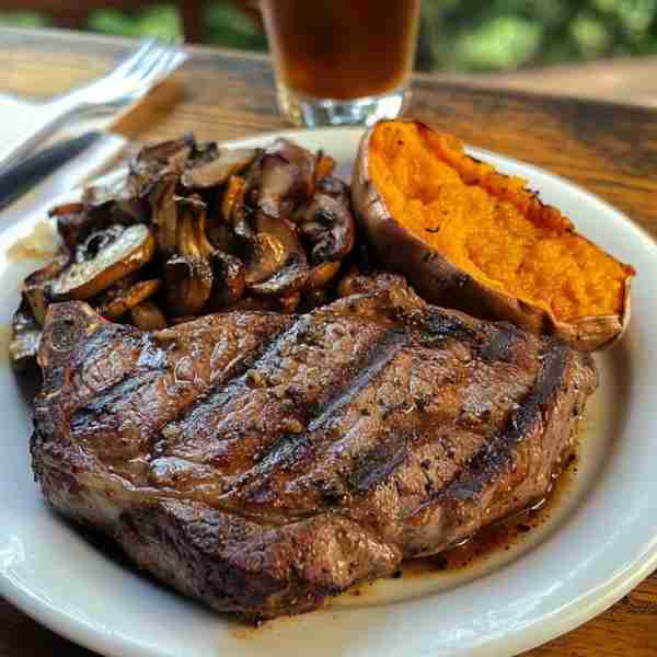 🥩 Grilled Ribeye with Mushrooms, Sweet Potato, and Wedges 🍠🍟 🌟 A Hearty Steakhouse Meal 🛒 Ingre...