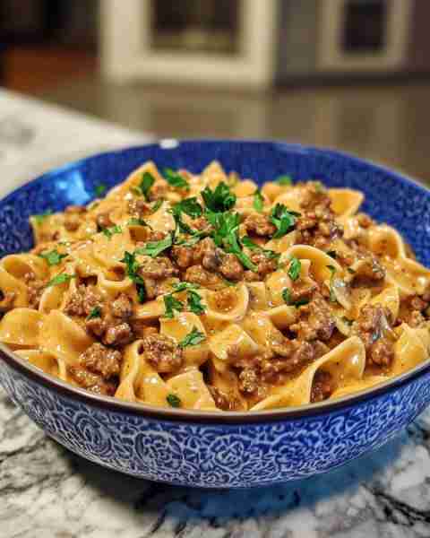 One-Pot Cheesy Beef Stroganoff with Velveeta and Pasta Ingredients: 2 lbs ground beef (80/20 for mor...