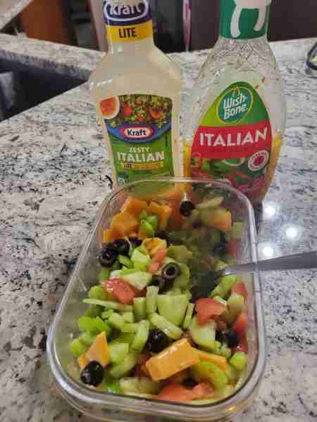 Ok not a "meal" but I devour this. Chopped cheddar cheese, olives, cucumber, celery, tomatoes, & a l...
